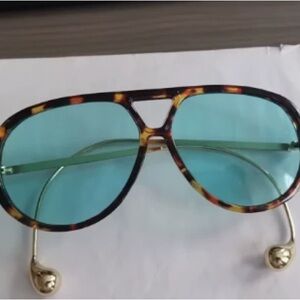 Elegant Tortoise Sunglasses with Aqua Lenses
